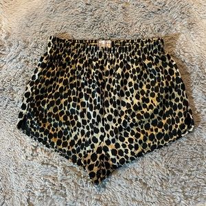 USA. Cheetah athletic shorts. Medium but fits more like a small.